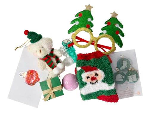 Product mix for Christmas gift bag for kids, including Plushy Bear Ornament, ⁠ ⁠Socks, Pop Keychain, ⁠Bath Bomb with Toy Inside, ⁠⁠Festive glasses, Mini Ornaments (3),  ⁠⁠and Personalized Letter with Stickers